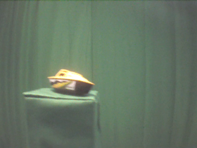270 Degrees _ Picture 9 _ Yellow Speedboat.png